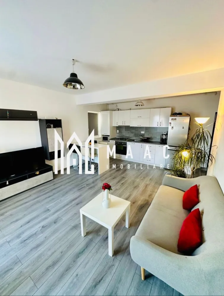Apartament 3 camere | 90 MPU | Cartierul Arhitectilor - Sibiu - MAAC Imobiliare va propune spre vanzare un apartament spațios și elegant, cu o suprafață utilă de 90 mp, situat în Cartierul Arhitecților – una dintre cele mai liniștite și apreciate zone rezidențiale din Sibiu.

Locuința este amplasată într-o vilă exclusivistă, cu regim redus de înălțime (doar 2 etaje), oferind un plus de intimitate și confort.

Detalii și beneficii:

Suprafață utilă: 90 mp
Complet mobilat și utilat, cu finisaje de calitate
Se predă la cheie, exact cum este prezentat
Living generos dotat cu colțar confortabil
Dormitor amenajat cu pat matrimonial
Bucătărie complet echipată: frigider, espressor, electrocasnice moderne
Mașină de spălat inclusă
Dotări complete – ideal pentru mutare imediată
2 locuri de parcare private incluse

Imobilul se află într-o zonă aerisită, liniștită, perfectă pentru locuit, dar și pentru investiție, având acces facil către oraș.
Pentru mai multe detalii si programarea unei vizionari va rugam sa specificati ID: CP3046448.