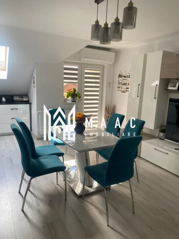 APARTAMENT 3 CAMERE i SELIMBAR I UNIRI I PARCARE - MAAC Imobiliare vă propune spre vânzare un apartament modern și spațios cu 3 camere, situat în Șelimbăr, zona Triajului - Unirii, într-o locație liniștită, perfectă pentru familii care își doresc confort și acces rapid la toate facilitățile necesare.

Imobilul este amplasat în apropierea școlii, grădiniței și magazinelor, oferind un stil de viață practic și relaxant.

Detalii proprietate:

* Suprafață utilă: 70 mp
* Pod pe toată suprafața apartamentului – ideal pentru mansardare sau spațiu generos de depozitare
* Compartimentare eficientă:
 * living open-space cu bucătărie
 * 2 dormitoare luminoase
 * baie cu geam de aerisire
 * 2 balcoane

Apartamentul se remarcă prin luminozitatea naturală, compartimentarea practică și starea foarte bună de întreținere, fiind pregătit pentru a deveni căminul perfect al noii familii.

O alegere excelentă atât pentru locuit, cât și pentru investiție!

Pt mai multe detalii precizați că ați văzut anunțul cu ID3049665