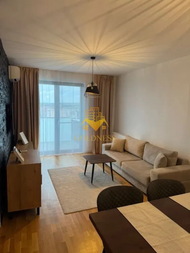 2 camere, modern, bloc nou,Intre Lacuri, zona Iulius mall, Park Lake - GOLDNESS Imobiliare vă propune spre închiriere un apartament cu 2 camere complet mobilat și utilat, la etajul 10 într-un imobil de 10 etaje, în cartierul Gheorgheni. 
Apartamentul este compartimentat astfel:
 - dormitor cu pat matrimonial, dressing, noptiere, TV
 - living cu bucatarie open-space complet utilată, canapea extensibla, loc de servit masa 
 - baie cu cada, calorifer port prosop inox și dulap pentru depozitare.
 - terasa de 8 mp.

Imobilul este dotat cu toate cele necesare- centrală proprie, mașină de spălat haine, masina de spalat vase,frigider, plită electrică, hotă, TV, etc. 
Se află în apropierea stațiilor de transport în comun, magazine, restaurante, spații verzi, farmacii, etc. 
Dispune de loc de parcare subterana inclusa in pret!

Dacă sunteți interesați de acest apartament și doriți să îl vizionați, dar și pentru alte oferte sau detalii nu ezitați să ne contactați telefonic sau prin e-mail - goldnessimobiliare@gmail.com. Vă stăm la dispoziție!