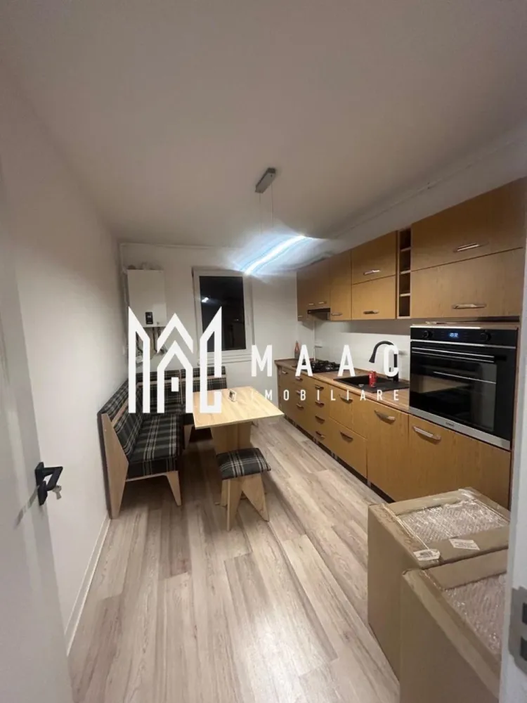 Apartament 2 Camere | Decomandat | Loc De Parcare - MAAC Imobiliare vă propune spre închiriere un apartament modern cu 2 camere decomandate, situat pe Calea Șurii Mici, într-o zonă liniștită și în plină dezvoltare. Locuința face parte dintr-o construcție nouă și se remarcă prin compartimentarea eficientă: din hol se accesează toate încăperile — livingul luminos, dormitorul confortabil, bucătăria mobilată și complet utilată, precum și baia dotată cu cabină de duș. Apartamentul oferă un nivel ridicat de confort și este ideal pentru persoane care caută o locuință curată, practică și bine amplasată. Nu se acceptă animale de companie. La semnarea contractului se solicită plata unei garanții, cuantumul unei luni de chirie. Pentru mai multe detalii și programarea unei vizionări, vă invităm să ne contactați, menționând ID-ul ofertei: CP2793414.