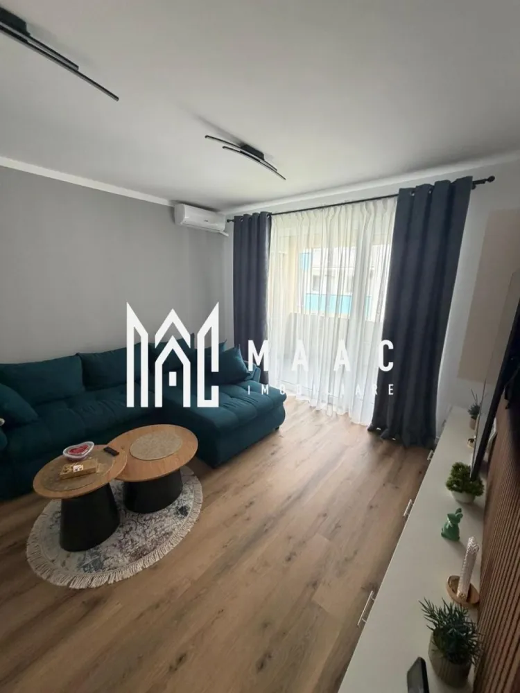 Apartamet 2 Camere | 60MPU | Loc de Parcare | Magnolia - MAAC Imobiliare vă propune spre inchiriere un apartament cu 2 camere, decomandat, situat într-un imobil nou, construit în anul 2024, ideal pentru locuit sau investiție.

Proprietatea are o suprafață utilă de 60 mp și se vinde mobilată și utilată, cu finisaje de calitate, fiind pregătită pentru mutare imediată.

Compartimentare
Living
Dormitor
Bucătărie
Baie
Hol
Dotări și beneficii
Imobil construit în 2024
Compartimentare decomandată
Se predă mobilat și utilat
Finisaje de calitate
Aer condiționat
Loc de parcare inclus
Avantaje
Construcție nouă
Apartament pregătit pentru mutare imediată
Potrivit pentru locuință personală sau investiție
Spațiu bine compartimentat și funcțional

Pentru mai multe detalii și programarea unei vizionări, vă rugăm să ne contactați menționând ID: CP3048213.