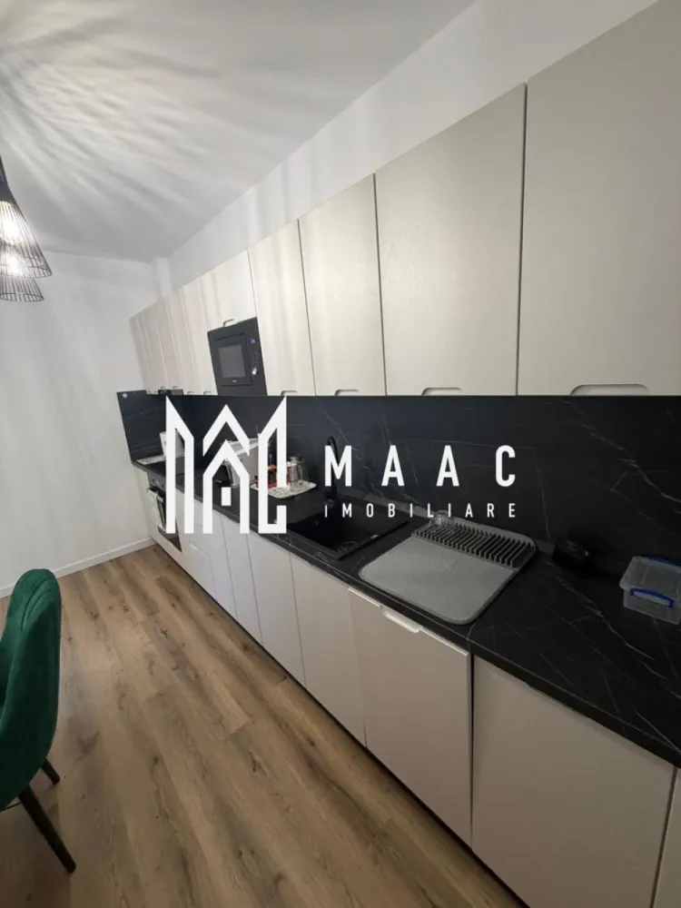 Apartamet 2 Camere | 60MPU | Loc de Parcare | Magnolia - MAAC Imobiliare vă propune spre inchiriere un apartament cu 2 camere, decomandat, situat într-un imobil nou, construit în anul 2024, ideal pentru locuit sau investiție.

Proprietatea are o suprafață utilă de 60 mp și se vinde mobilată și utilată, cu finisaje de calitate, fiind pregătită pentru mutare imediată.

Compartimentare
Living
Dormitor
Bucătărie
Baie
Hol
Dotări și beneficii
Imobil construit în 2024
Compartimentare decomandată
Se predă mobilat și utilat
Finisaje de calitate
Aer condiționat
Loc de parcare inclus
Avantaje
Construcție nouă
Apartament pregătit pentru mutare imediată
Potrivit pentru locuință personală sau investiție
Spațiu bine compartimentat și funcțional

Pentru mai multe detalii și programarea unei vizionări, vă rugăm să ne contactați menționând ID: CP3048213.