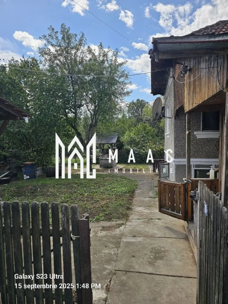 Casa cu teren | Bogdanesti | 4.012 mp - MAAC Imobiliare vă propune spre vânzare o proprietate compusă din casă și teren generos, situată în satul Bogdănești, în zona Horezu, județul Vâlcea, într-un cadru liniștit, aproape de natură, ideal pentru locuire permanentă, casă de vacanță sau investiție în scop turistic. Amplasarea într-o zonă în dezvoltare, cu potențial turistic ridicat, oferă multiple oportunități de valorificare pe termen lung.

Proprietatea dispune de o suprafață totală de teren de 4012 mp, oferind spațiu amplu pentru amenajări suplimentare, extindere sau dezvoltarea unui proiect de tip pensiune. Deschiderea la stradă de 17 metri facilitează accesul auto și permite o bună organizare a spațiului.

Caracteristici principale:
-casă + teren
-suprafață totală teren: 4012 mp
-deschidere de 17 metri la stradă
-acces auto

Avantaje și potențial:
-zonă liniștită, aproape de natură
-potrivită pentru locuință permanentă sau casă de vacanță
-potențial turistic ridicat, zona Horezu fiind în dezvoltare

Utilități:
-apă la poartă
-curent electric

Poziționarea în satul Bogdănești, în apropiere de Horezu, oferă un echilibru între intimitate, natură și accesibilitate, fiind o alegere potrivită pentru cei care caută o proprietate cu teren generos într-o zonă cu perspectivă de creștere.

Pentru mai multe detalii și programarea unei vizionări, vă rugăm să contactați MAAC Imobiliare și să menționați la telefon numărul CP3055589.