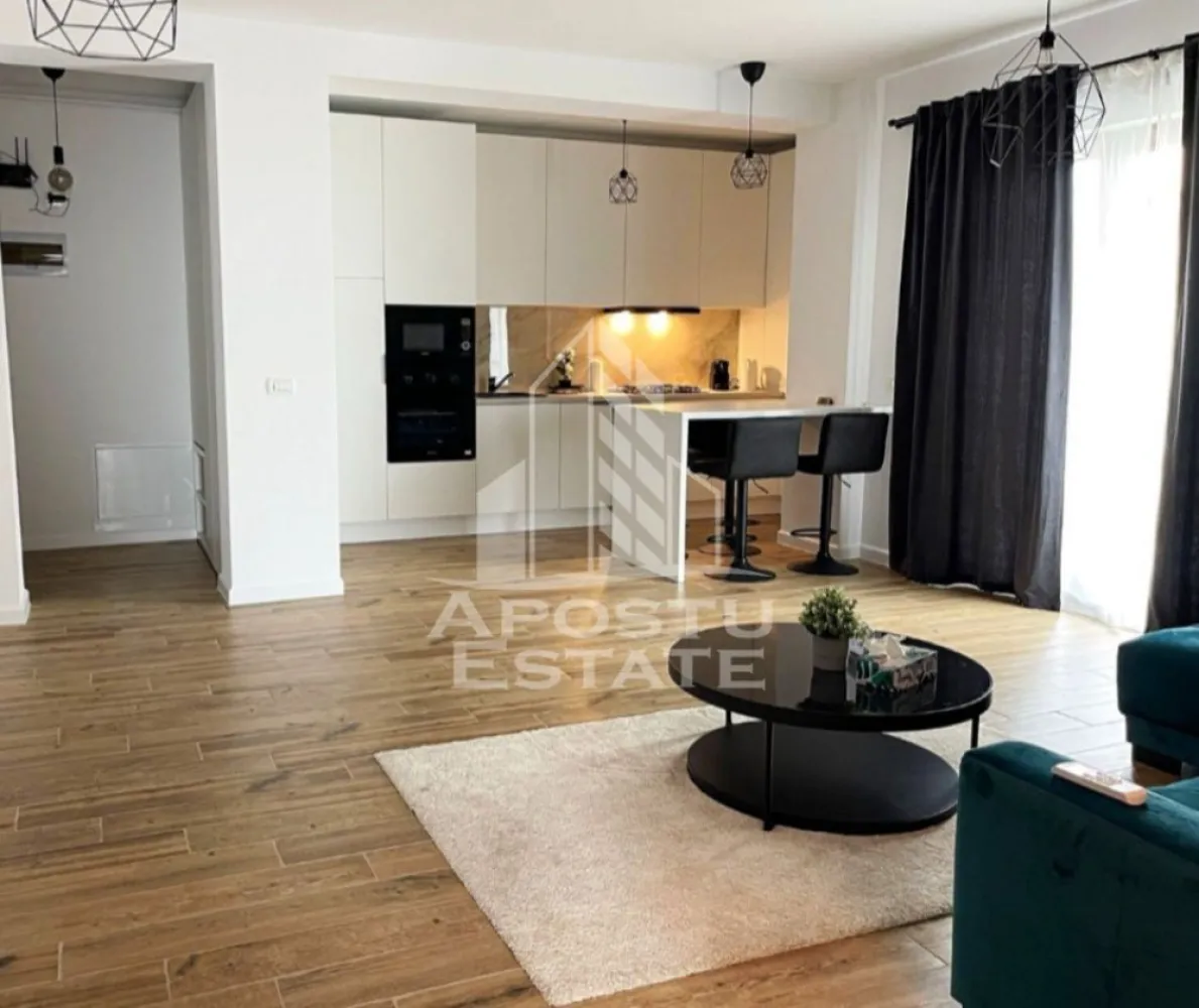 Apartament modern,2 camere,etaj 1,Dumbravita - Agentia imobiliara Apostu Estate va propune spre vanzare un apartament modern cu 2 camere, situat intr-o zona excelenta din Dumbravita, in apropierea magazinelor Ikea, Profi si Lidl, cu acces rapid catre Timisoara si principalele puncte de interes.

Apartamentul este amplasat la etajul 1 al unui imobil cu regim de inaltime P+3 si dispune de o suprafata utila de 59 mp. Se vinde complet mobilat si utilat, fiind pregatit pentru mutare imediata.

Compartimentare:

-hol de acces;

-living spatios cu bucatarie open space;

-dormitor;

-baie;

-terasa.

Confortul termic este asigurat prin centrala termica proprie, incalzire in pardoseala si aparat de aer conditionat, oferind un nivel ridicat de confort in orice anotimp.

Proprietatea beneficiaza de 2 locuri de parcare incluse, un avantaj important pentru viitorii proprietari.

Acest apartament reprezinta alegerea ideala atat pentru locuinta proprie, cat si pentru investitie, datorita amplasarii excelente si cererii ridicate din zona.

Pentru mai multe informatii si programarea unei vizionari, echipa Apostu Estate va sta cu drag la dispozitie.

Va oferim consultanta si solutii financiare prin colaboratorii nostrii!