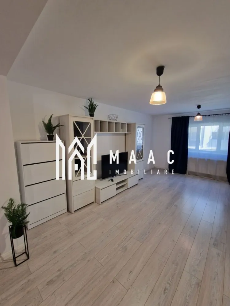 Apartament 3 camere | 90 MPU | Terasa 13MP | Selimbar - MAAC Imobiliare vă propune spre închiriere un apartament modern, decomandat, situat într-o zonă liniștită și accesibilă din Șelimbăr. Ideal pentru o familie sau pentru cei care își doresc un spațiu generos și bine compartimentat.

Proprietatea îmbină perfect confortul cu funcționalitatea, oferind un ambient plăcut pentru locuire pe termen lung.

Compartimentare:
 living primitor și luminos
 2 dormitoare 
 bucătărie separată, complet utilată
 2 băi 
 hol

Dotări și avantaje
bucătărie separată – ideală pentru gătit frecvent
compartimentare inteligentă pentru intimitate și confort
spații generoase și bine aerisite
2 balcoane perfecte pentru relaxare
 situat într-un imobil nou/modern
 zonă liniștită, ferită de agitația traficului

Localizare:
 în apropiere de centre comerciale (Shopping City Sibiu) magazine, farmacii, școli, grădinițe.
 acces rapid către oraș.

Condiții de închiriere:
 garanție: echivalentul unei chirii lunare
 disponibilitate: imediată; se caută chiriași serioși pentru contract pe termen lung 
 nu se acceptă animale de companie
 fumatul este permis doar pe balcon

Pentru mai multe detalii sau pentru programarea unei vizionări, vă rugăm să ne contactați. ID: CP3055632