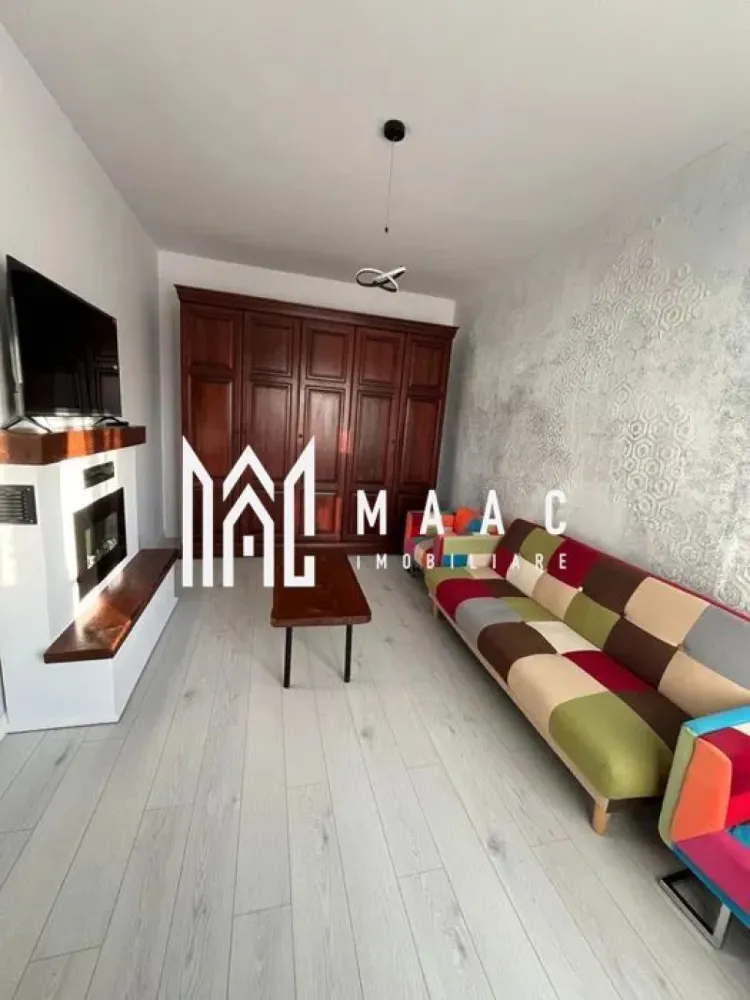 Apartament 2 camere de închiriat | Țiglari, Sibiu | decomandat, 50 mp - Apartament cu 2 camere decomandat de închiriat în Țiglari, Sibiu, situat la parter, cu 50 mp utili, balcon și loc de parcare inclus.

Detalii proprietate:
• Suprafață utilă: 50 mp, suprafață construită: 60 mp
• Compartimentare: hol, living, dormitor, bucătărie și baie
• Parter din 4, într-un imobil finalizat în anul 2000
• Stare interioară bună, orientare Sud-Est
• Balcon cu acces din living și dormitor
• Încălzire în pardoseală și termostat individual în fiecare cameră
• Șemineu electric și rulouri la geamuri
• Loc de parcare inclus în apropierea blocului

Apartamentul este amplasat într-o zonă liniștită din cartierul Țiglari, cu acces rapid către Centru și Zona de Vest a orașului Sibiu.

Cod anunț CP3061596. Contactați-ne pentru o vizionare și pentru mai multe detalii despre această proprietate.