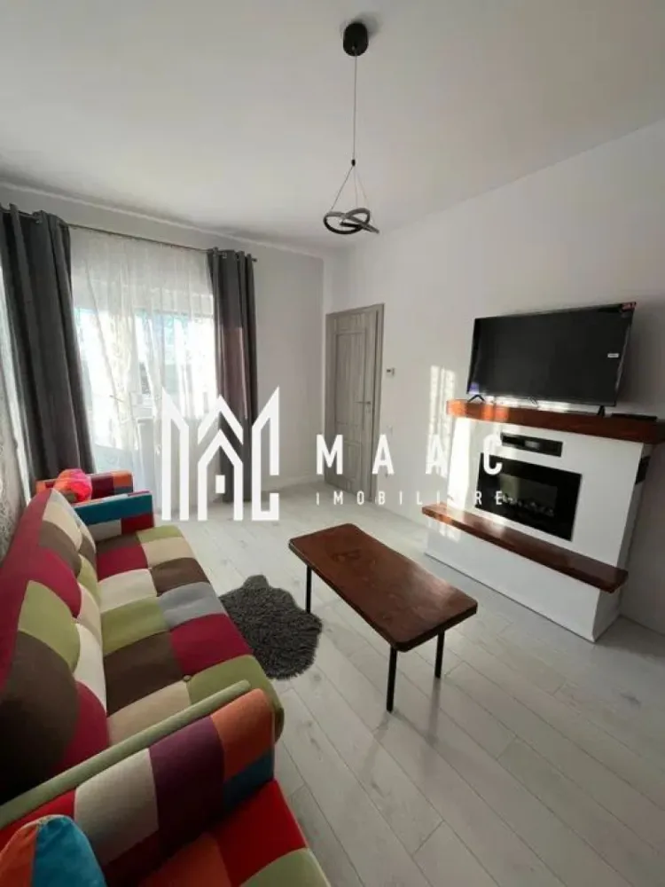 Apartament 2 camere de închiriat | Țiglari, Sibiu | decomandat, 50 mp - Apartament cu 2 camere decomandat de închiriat în Țiglari, Sibiu, situat la parter, cu 50 mp utili, balcon și loc de parcare inclus.

Detalii proprietate:
• Suprafață utilă: 50 mp, suprafață construită: 60 mp
• Compartimentare: hol, living, dormitor, bucătărie și baie
• Parter din 4, într-un imobil finalizat în anul 2000
• Stare interioară bună, orientare Sud-Est
• Balcon cu acces din living și dormitor
• Încălzire în pardoseală și termostat individual în fiecare cameră
• Șemineu electric și rulouri la geamuri
• Loc de parcare inclus în apropierea blocului

Apartamentul este amplasat într-o zonă liniștită din cartierul Țiglari, cu acces rapid către Centru și Zona de Vest a orașului Sibiu.

Cod anunț CP3061596. Contactați-ne pentru o vizionare și pentru mai multe detalii despre această proprietate.