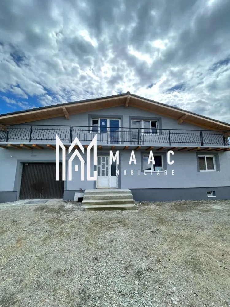 Casă individuală I 240 MPU I Teren 650 MP I Cornețel-Sibiu - MAAC Imobiliare va propune spre vanzare o casă individuală spațioasă, situată în Cornețel, la doar 15 km de Sibiu – ideală pentru cei care își doresc liniște, aer curat și acces rapid către oraș.

Detalii proprietate:

Suprafață utilă: 240 mp
Compartimentare: 4 camere decomandate
3 băi
2 dressing-uri
2 balcoane
Pivniță
Garaj

Teren:

Suprafață teren: 650 mp
Posibilitate extindere teren până la 1500 mp

Stadiu și construcție:

Construcție nouă
Se predă la stadiul de „alb”, exact ca în fotografii
Ideală pentru personalizare după propriul gust

Alte informații:

Toate actele sunt în regulă
Se poate achiziționa și prin credit ipotecar

Această proprietate reprezintă o alegere excelentă pentru o locuință de familie, oferind spațiu generos atât în interior, cât și în exterior.
Pentru mai multe detalii si programarea unei vizionari va rugam sa specificati ID: CP3062621.