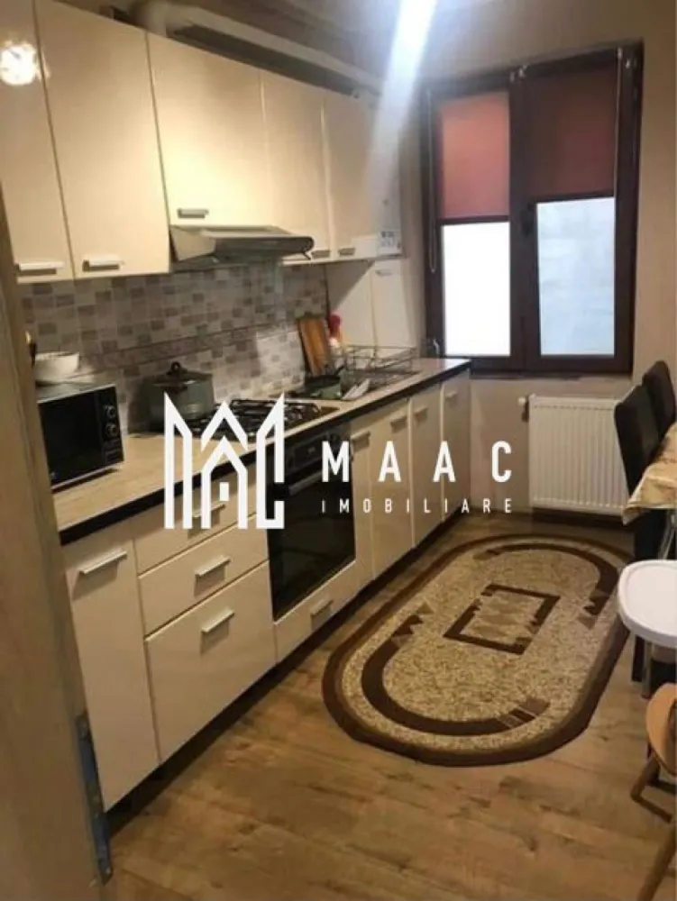 Apartament | 2 Camere | 56 Mp | Balcon | Șelimbăr - MAAC Imobiliare vă propune spre vânzare un apartament modern și primitor, situat chiar la intrarea în Șelimbăr, într-o zonă accesibilă și în plină dezvoltare, cu acces rapid către Sibiu și principalele puncte de interes.

Suprafață utilă: 56 mp
Balcon: 7 mp

Apartamentul este complet mobilat, oferind un ambient plăcut și fiind pregătit pentru mutare imediată, fără investiții suplimentare.

Compartimentare eficientă:

1 dormitor confortabil
Living spațios și luminos
Bucătărie separată
Baie modernă
Balcon generos de 7 mp, ideal pentru relaxare

Locuința se remarcă prin compartimentarea practică, lumina naturală din abundență și atmosfera caldă, fiind potrivită atât pentru locuit, cât și ca investiție sigură.

Datorită poziționării excelente, proprietatea beneficiază de acces rapid către Sibiu, centre comerciale, mijloace de transport și alte facilități importante.

Dacă îți dorești un cămin bine poziționat, cu spații bine gândite și confort sporit, acest apartament poate fi alegerea ideală.

Pentru mai multe detalii sau pentru programarea unei vizionări, vă rugăm să ne contactați specificând ID:CP2985167
