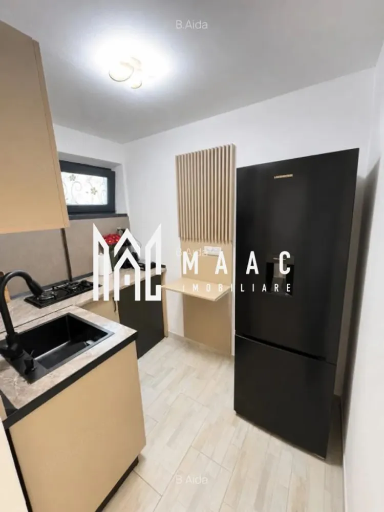 Apartament 2 camere | Nord, Râmnicu Vâlcea | 29 mp, mobilat - Apartament cu 2 camere de vânzare în zona Nord din Râmnicu Vâlcea, renovat, cu 29 mp utili, situat la etajul 3 din 4. Se vinde complet mobilat și utilat, cu disponibilitate imediată.

Detalii proprietate:
• Suprafață utilă: 29 mp
• Suprafață construită: 34,8 mp
• Compartimentare: decomandat
• Configurație: living, dormitor, bucătărie, baie și hol
• Etaj 3 din 4, bloc finalizat în 1977
• Stare interioară: renovat
• Baie renovată complet, inclusiv instalația sanitară
• Ferestre tripan cu tâmplărie PVC
• Confort 1

În fața imobilului este un parc, iar în apropiere se află magazine, piață, stații de transport în comun și grădinițe.

Contactează echipa MAAC pentru detalii despre acte și programarea unei vizionări.
Cod anunț: CP3233147

Conținut optimizat cu AI, aprobat de agent uman.