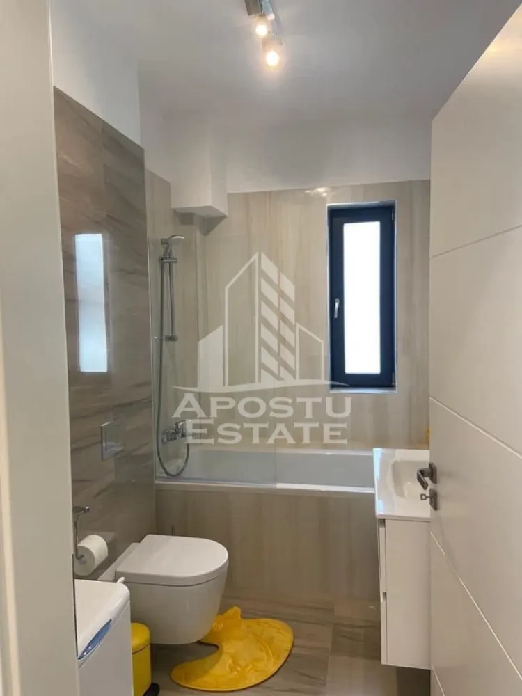 Apartament cu 2 camere de închiriat, Giroc, Future Residence - Agentia Imobiliara APOSTU ESTATE va ofera spre inchiriere un apartament cu 2 camere, situat in zona Giroc.
Acest apartament cu o suprafata de 67 mp dispune de urmatoarele facilitati:
- Bucatarie spatioasa, complet utilata, cu loc de luat masa;
- Hol de acces;
- Sufragerie luminoasa, cu acces la un balcon generos;
- Dormitor mobilat cu pat matrimonial;
- Baie dotata cu cada si geam pentru ventilatie naturala.
- 2 locuri de parcare 

Confortul termic este asigurat de centrala proprie pe gaz. Apartamentul se bucura de o pozitionare privilegiata, oferind acces rapid la diverse puncte de interes din zona:
-Lidl;
-Benzinarie;
-Mijloace de transport in comun;

Apartamentul este disponibil incepand cu 1 iunie.
Va invitam cu drag sa programati o vizionare pentru a aprecia personal toate facilitatile si avantajele acestui apartament.

ID intern: CP2025750!
