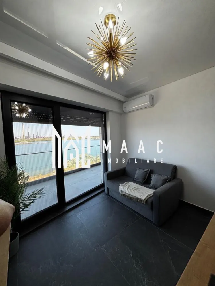 Apartament 2 camere | Vedere spre Mare | Etaj 2 - Apartament cu vedere la mare – Mamaia Nord | 45 mp | MAAC Imobiliare

MAAC Imobiliare vă propune spre vânzare un apartament superb situat în Mamaia Nord, cu vedere directă la mare, într-un bloc modern cu fațadă ventilată , construit la standarde premium.

Suprafață utilă:45 mp
Compartimentare:living cu bucătărie open-space, dormitor, baie, balcon
Vedere: panoramică spre mare

Dotări și avantaje:

* Mobilat și utilat complet, gata pentru locuire sau închiriere
* Aer condiționat
* Centrală proprie pe gaz
* Finisaje moderne, de calitate superioară
* Bloc cu fațadă ventilată – eficiență energetică și izolare excelentă
* Locație excelentă, la doar câțiva pași de plajă, restaurante și puncte de interes

 Ideal pentru:

* Locuință de vacanță
* Investiție profitabilă (închiriere sezonieră sau pe termen lung)

Pentru detalii suplimentare și programarea unei vizionări, contactați MAAC Imobiliare.

id-CP2781840
