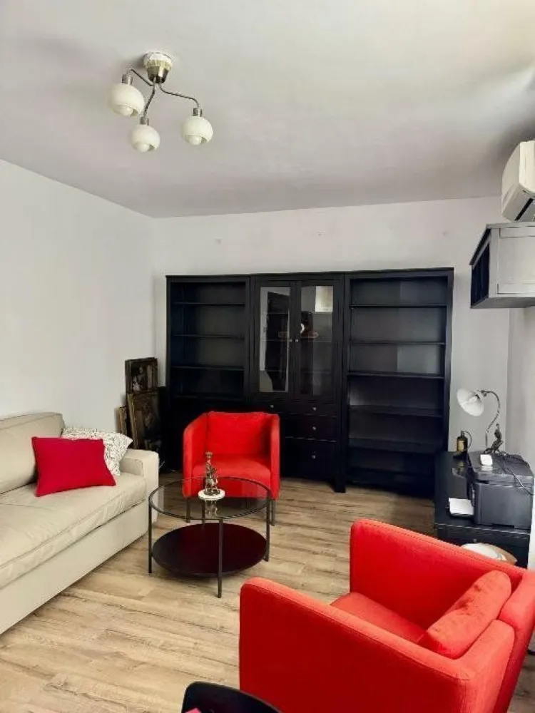 Apartament de închiriat în Floreasca: 2 Camere, 51mp, Mobilat şi Utilat Modern - Te invităm să descoperi un apartament modern şi cochet de 2 camere, cu o suprafaţă de 51,80 mp, situat într-o zonă exclusivistă din Floreasca. Apartamentul este complet mobilat şi utilat modern, oferind un ambient confortabil şi funcţional.
Caracteristici principale:
- Amenajare interioară contemporană, cu finisaje de calitate
- Bucătărie complet mobilată şi echipată cu aragaz, cuptor, frigider, maşină de spălat, espressor
- Dormitor şi living spaţios, proiectate pentru confort maxim
- Baie modernă
- Centrală proprie pentru încălzire şi apă caldă
- Balcon spaţios, amenajat perfect pentru momentele de relaxare
- Localizare centrală şi liniştită, cu acces facil la mijloace de transport în comun, parcuri, restaurante, supermarketuri şi zone comerciale
Acest apartament este ideal pentru cei care caută un spaţiu modern şi bine întreţinut, cu o amplasare ideală în zona de nord a Capitalei. 
Pentru mai multe detalii sau pentru a stabili o vizionare, vă rugăm să ne contactaţi.