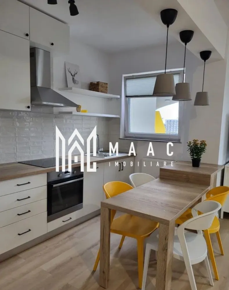 Apartament 2 camere | Balcon | Parcare | Hipodrom 3 - MAAC Imobiliare vă propune spre închiriere un apartament modern și primitor, aflat la prima închiriere, situat într-un imobil nou, dotat cu lift și loc de parcare privat, în zona Cireșica – Sibiu. Detalii apartament: Suprafață utilă: 58 mp Compartimentare: living generos cu bucătărie open-space, dormitor spațios, baie modernă și balcon de 12 mp, cu priveliște spectaculoasă spre Munții Făgăraș și Cindrel. Dotări și facilități: Complet mobilat și utilat modern Electrocasnice de ultimă generație: mașină de spălat vase, frigider, mașină de spălat și uscător de haine, televizor, aer condiționat Dormitor izolat fonic pentru confort sporit Clădire nouă cu lift și loc de parcare inclus Se percepe o garanție în valoare echivalentă cu o lună de chirie, achitată la semnarea contractului. Pentru mai multe detalii sau pentru a programa o vizionare, vă rugăm să ne contactați. Specificați ID-ul CP2777316.